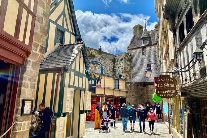 The steep cobbled Grande Rue with old half-timbered houses